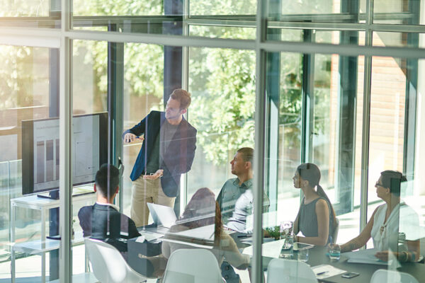 Sales-Driven Organisation - A group of employees having a meeting