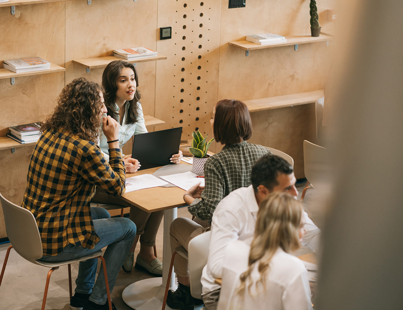 Technology Solutions - Employees discussing market strategy