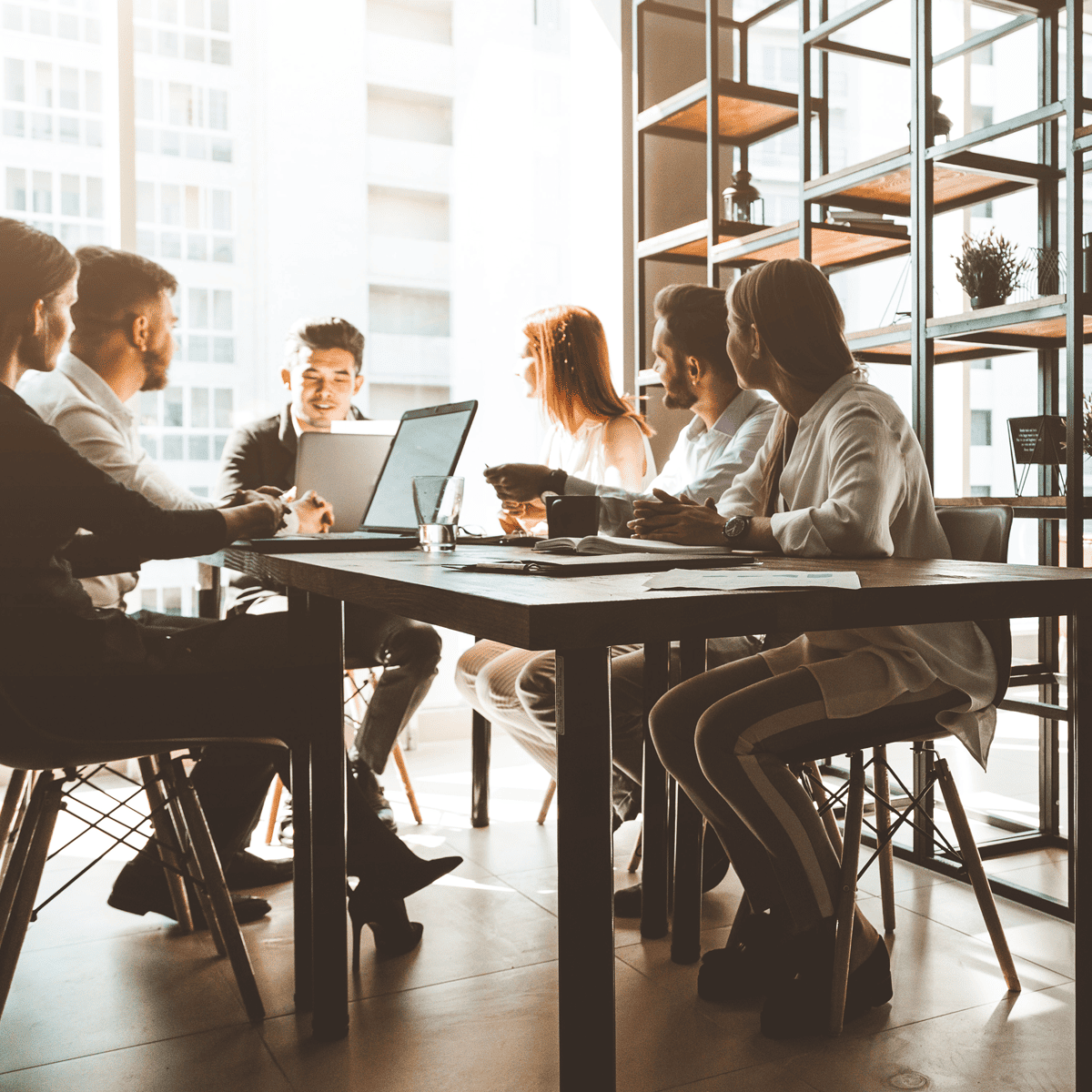 Digital Marketing Strategy - A team discussing marketing plans